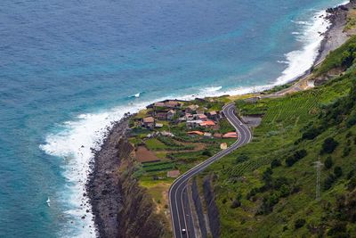 High angle view of road by sea