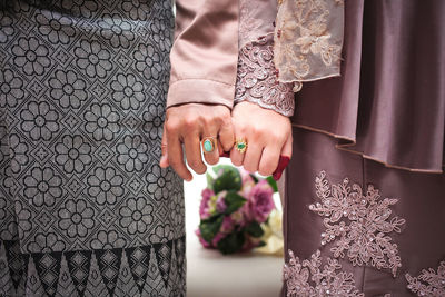 Couple hugging on their wedding. bride and groom holding hands.