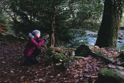 Woman photographing nature