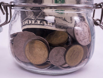 High angle view of coins in container