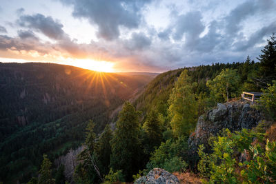 Scenic view of mountains against sky during sunset