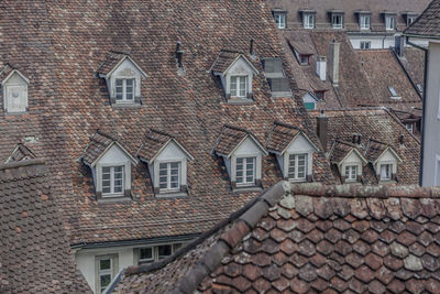 Houses against sky in city