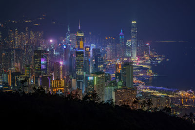 Illuminated buildings in city at night