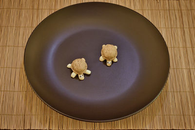 High angle view of cookies in plate on table