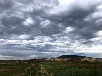 Scenic view of field against sky