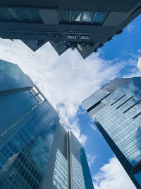 Low angle view of modern buildings against sky