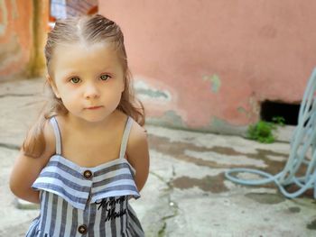 Portrait of cute girl standing outdoors