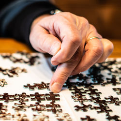 Close-up of hands on table