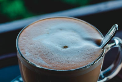 Close-up of coffee cup on table