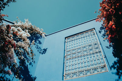 Low angle view of building against blue sky