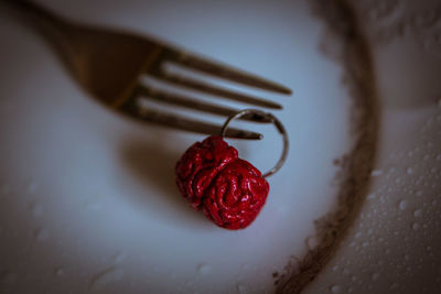 Close-up of cherries on plate