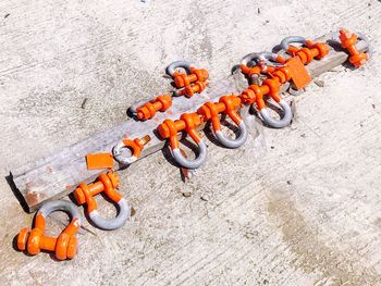 High angle view of orange toys on floor