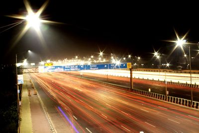 Light trails on city street at night