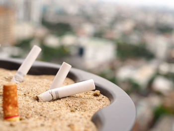 Close-up of cigarette smoking outdoors