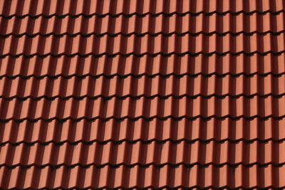 Full frame shot of roof tiles on sunny day