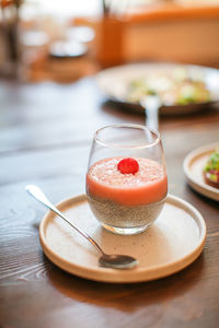 Close-up of cocktail in glass on table