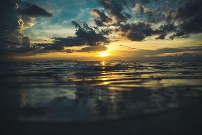 Scenic view of sea against dramatic sky