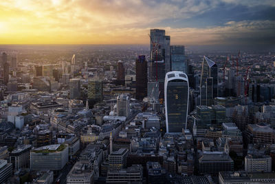 High angle view of cityscape against sky during sunset