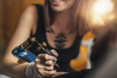 Female tattoo artist