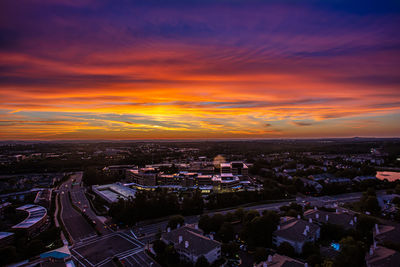 High angle view of townscape against sky at sunset