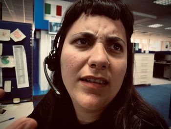Close-up portrait of handsome man at home