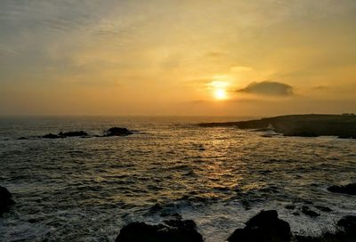 Scenic view of sea against sky during sunset