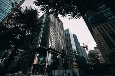 Low angle view of modern buildings against sky