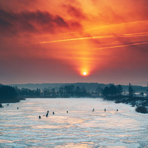 Scenic view of sea against sky during sunset