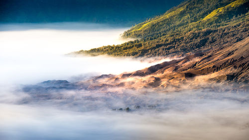 Aerial view of mountain covered with cloudscape