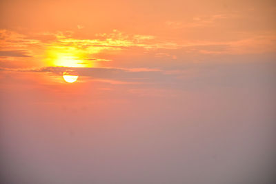 Scenic view of dramatic sky during sunset