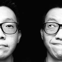 Close-up portrait of handsome young man wearing eyeglasses