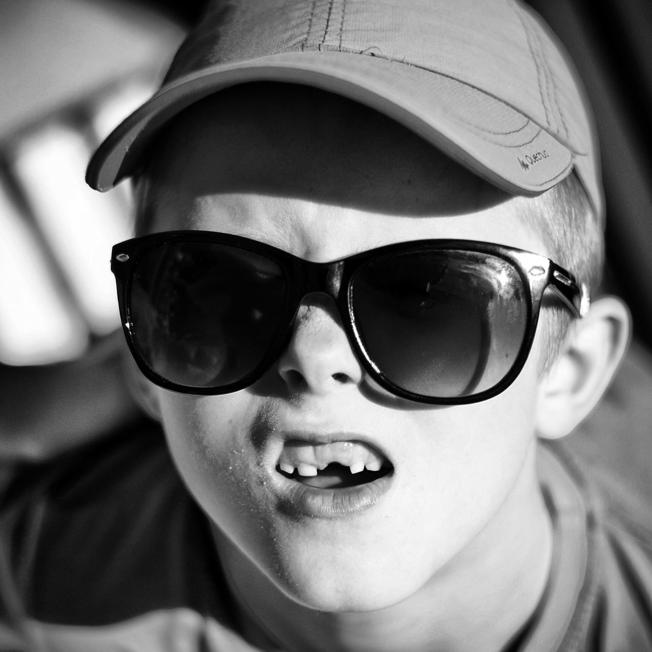 looking at camera, portrait, close-up, sunglasses, childhood, focus on foreground, headshot, indoors, front view, person, innocence, lifestyles, leisure activity, cute, toy, elementary age, smiling, boys