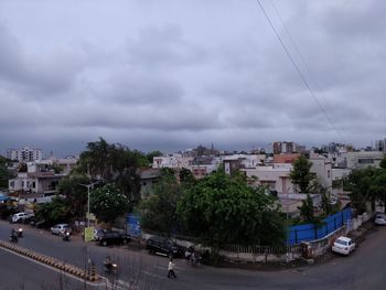 View of city against cloudy sky