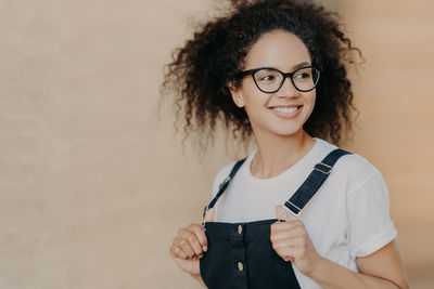 Portrait of a smiling young woman