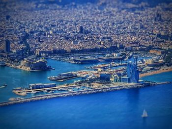 High angle view of cityscape by sea