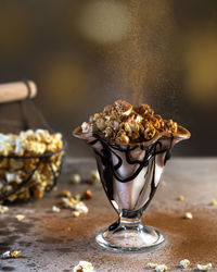 Festive drink decorated with popcorn and cinnamon