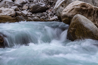 Long exposure shot of pinder river in motion on the way to the pindari glacier hike in october 2018.