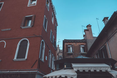 Low angle view of residential building against sky