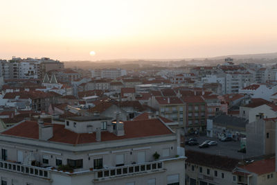 High angle view of townscape against sky during sunset