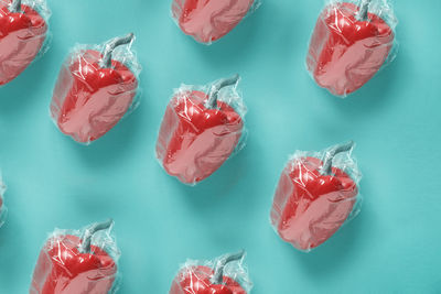 Multi colored candies against blue background