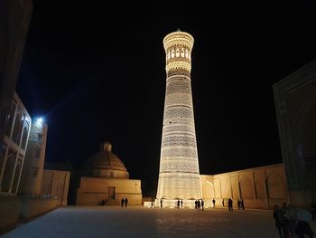 Low angle view of historical building at night