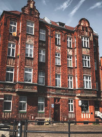 Low angle view of old building against sky