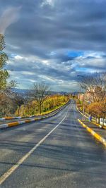 Road against cloudy sky