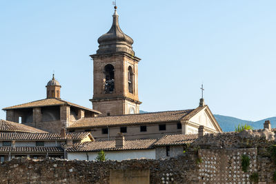 Low angle view of buildings against clear sky