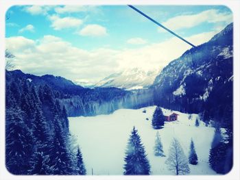 Scenic view of snow covered mountains