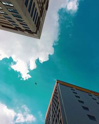 Low angle view of modern buildings against sky