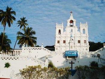 Low angle view of our lady of the immaculate conception church against sky