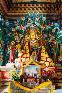 Statue in temple outside building