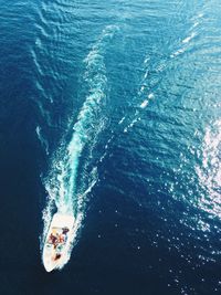 High angle view of boat sailing in sea