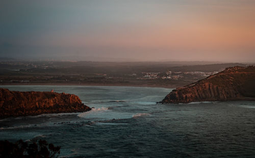 Scenic view of sea against sky during sunset in são martinho do porto